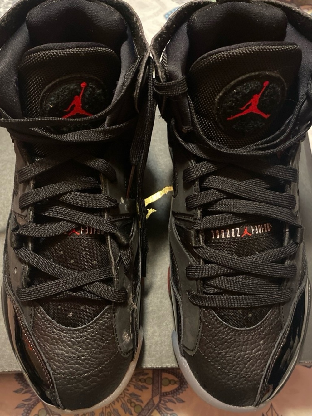 Jordan Men’s Black Sneakers with Red Jumpman Accents